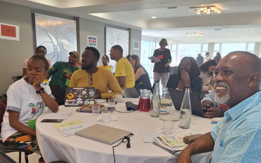 Community members and organisers at an energy democracy workshop
